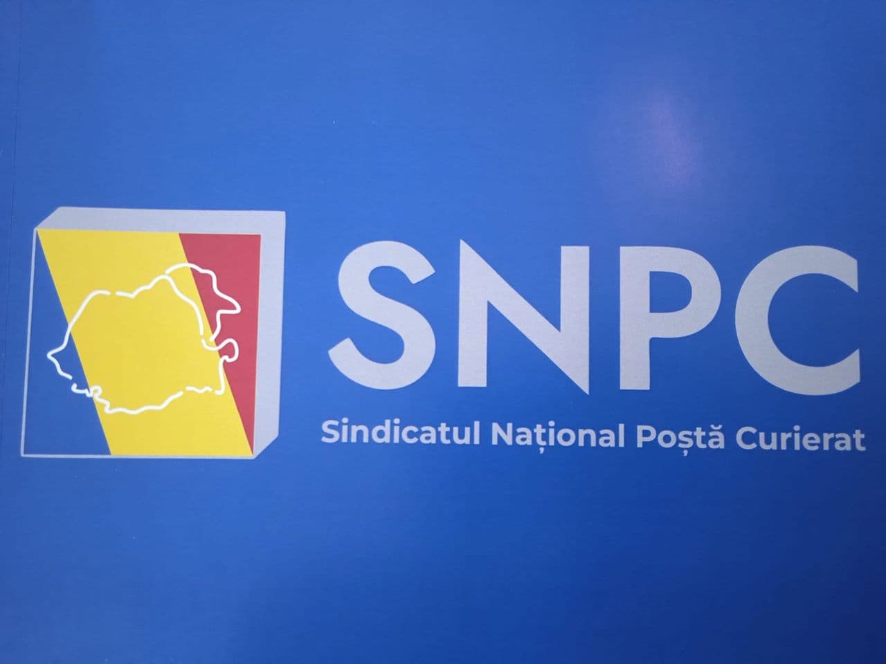 Sigla SNPC — Sindicatul Național Poștă Curierat
